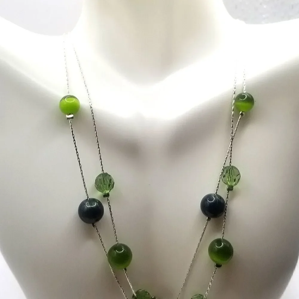 silver toned layered green floating Beaded womans necklace and earrings set. - Picture 7 of 9